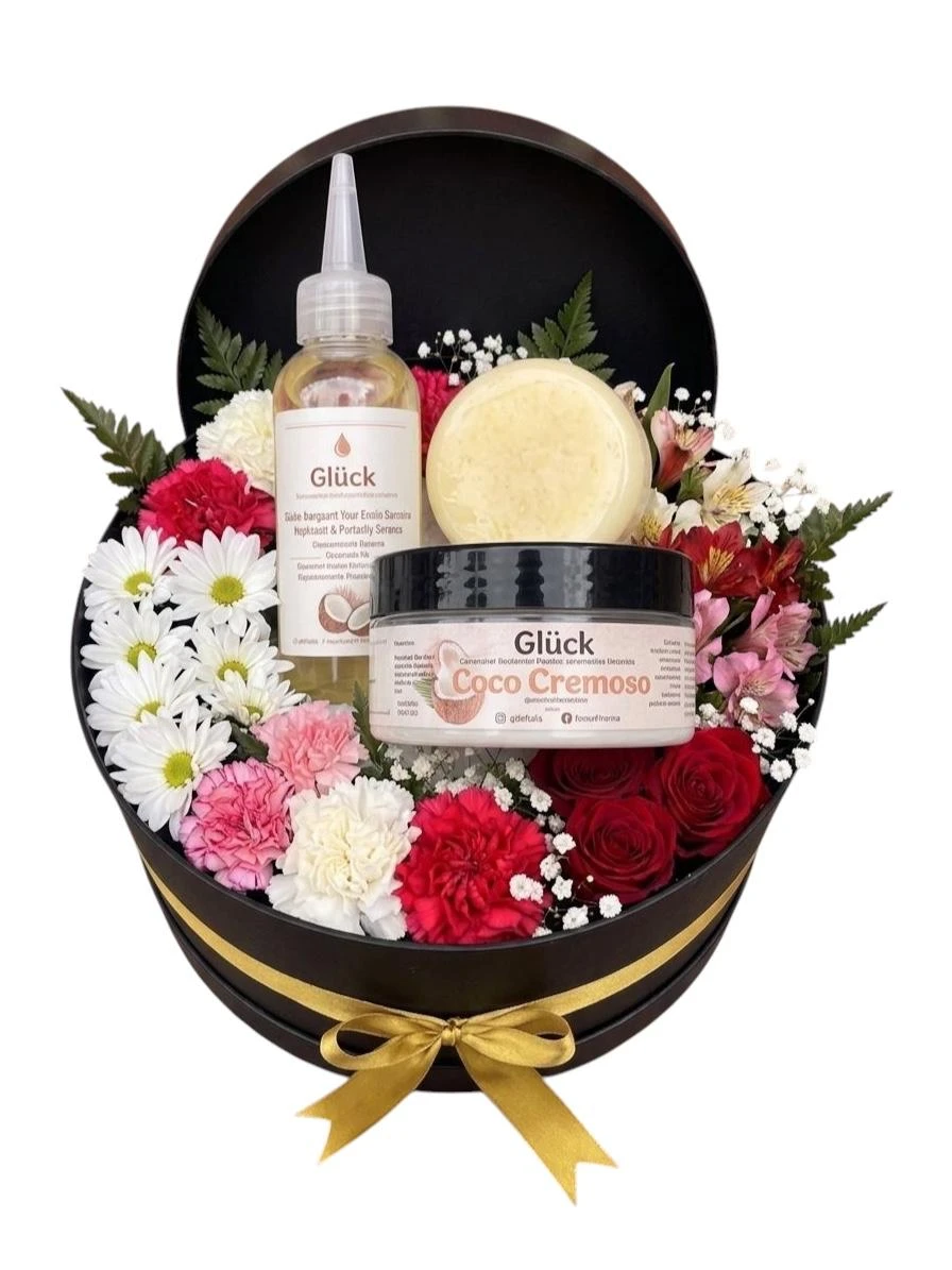 Caja De Flores Variadas Con Ancheta De Autocuidado — flores para agradecimiento. Flores Les Roses, envío a domicilio.